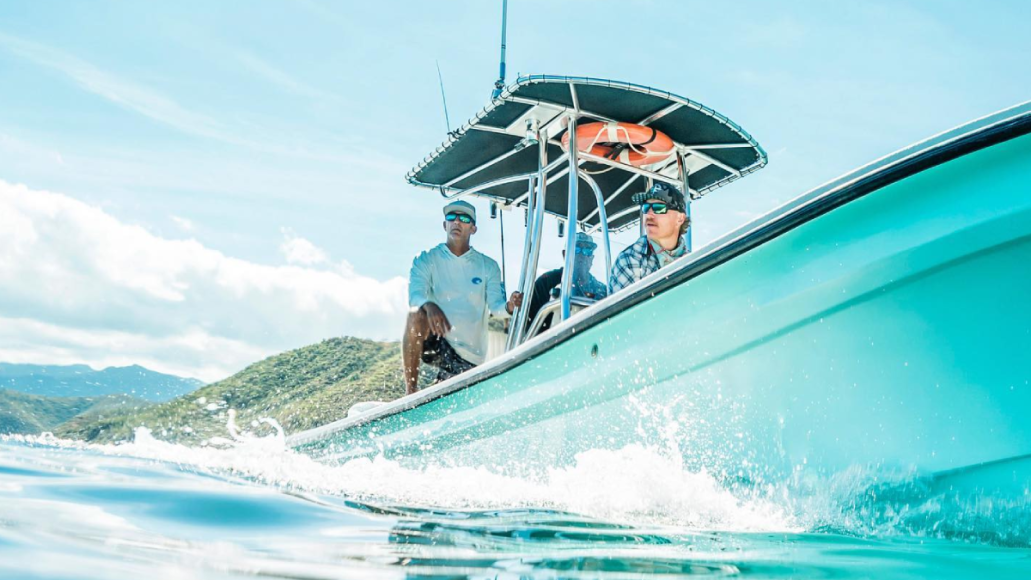 Fishermen on boat wearing Costa sunglasses