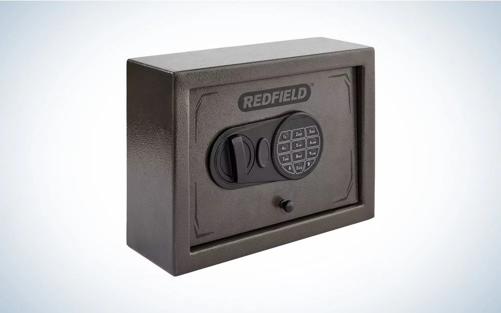 A gray and black Redfield drawer pistol lock box on a gray and white gradient background.