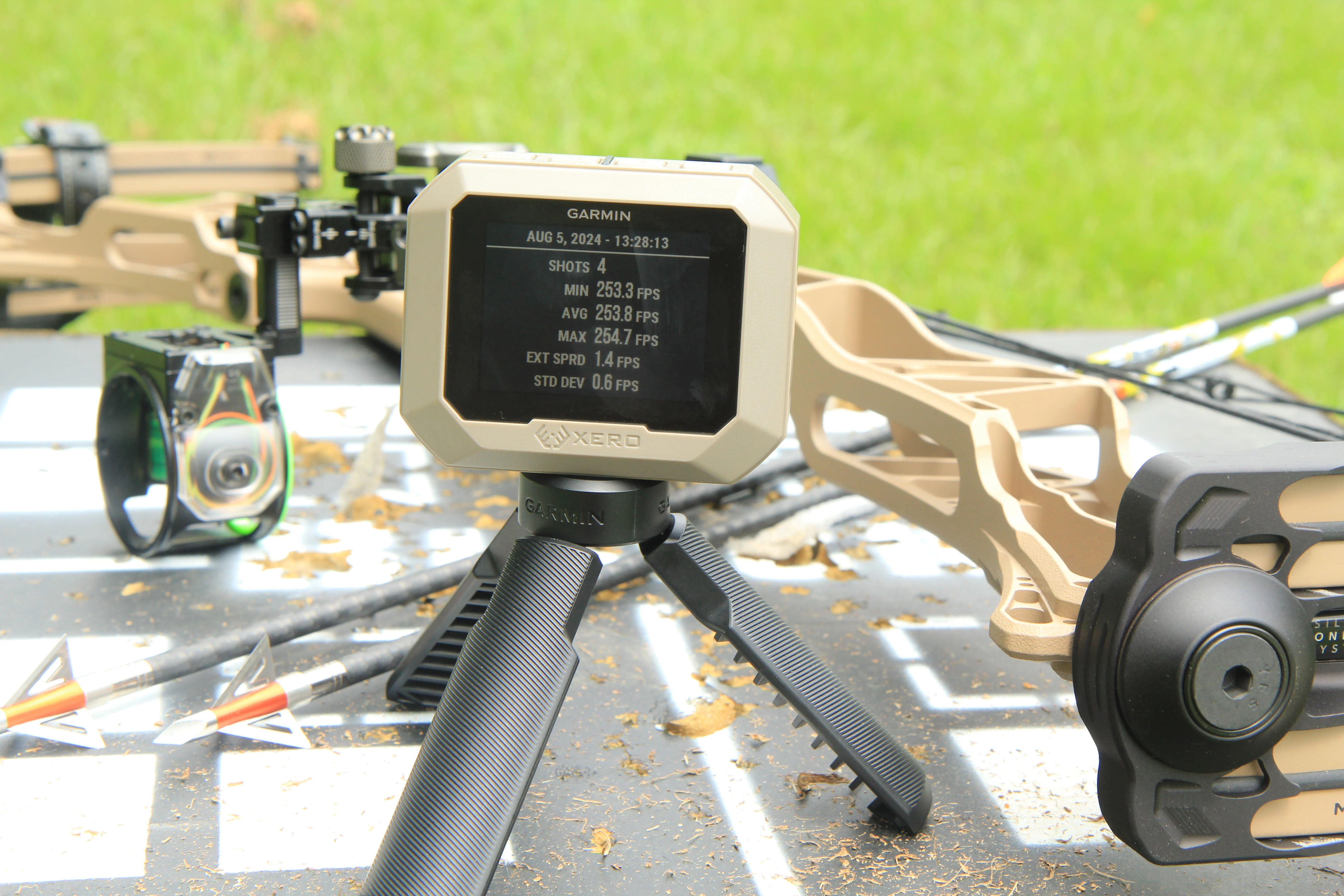 The new Garmin Xero C1 Pro chronograph on a table with a bow. 