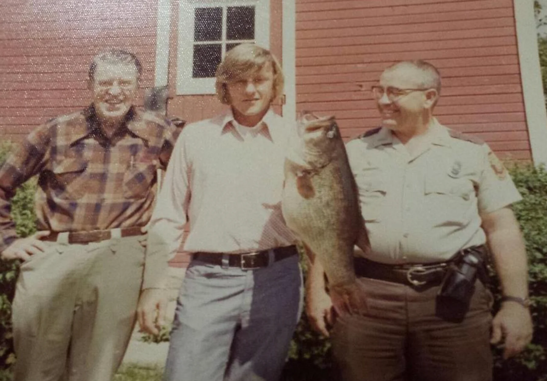 An angler poses with the state record largemouth bass in Ohio. 