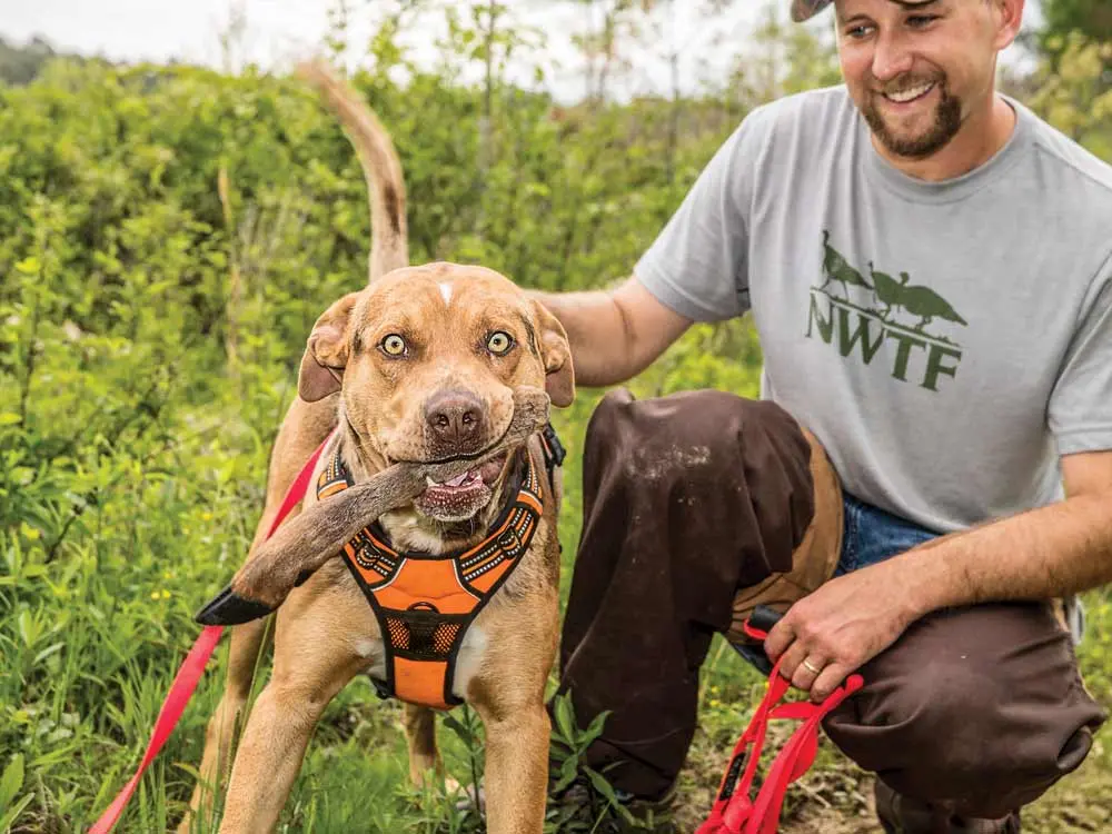 will brantley with his hunting dog