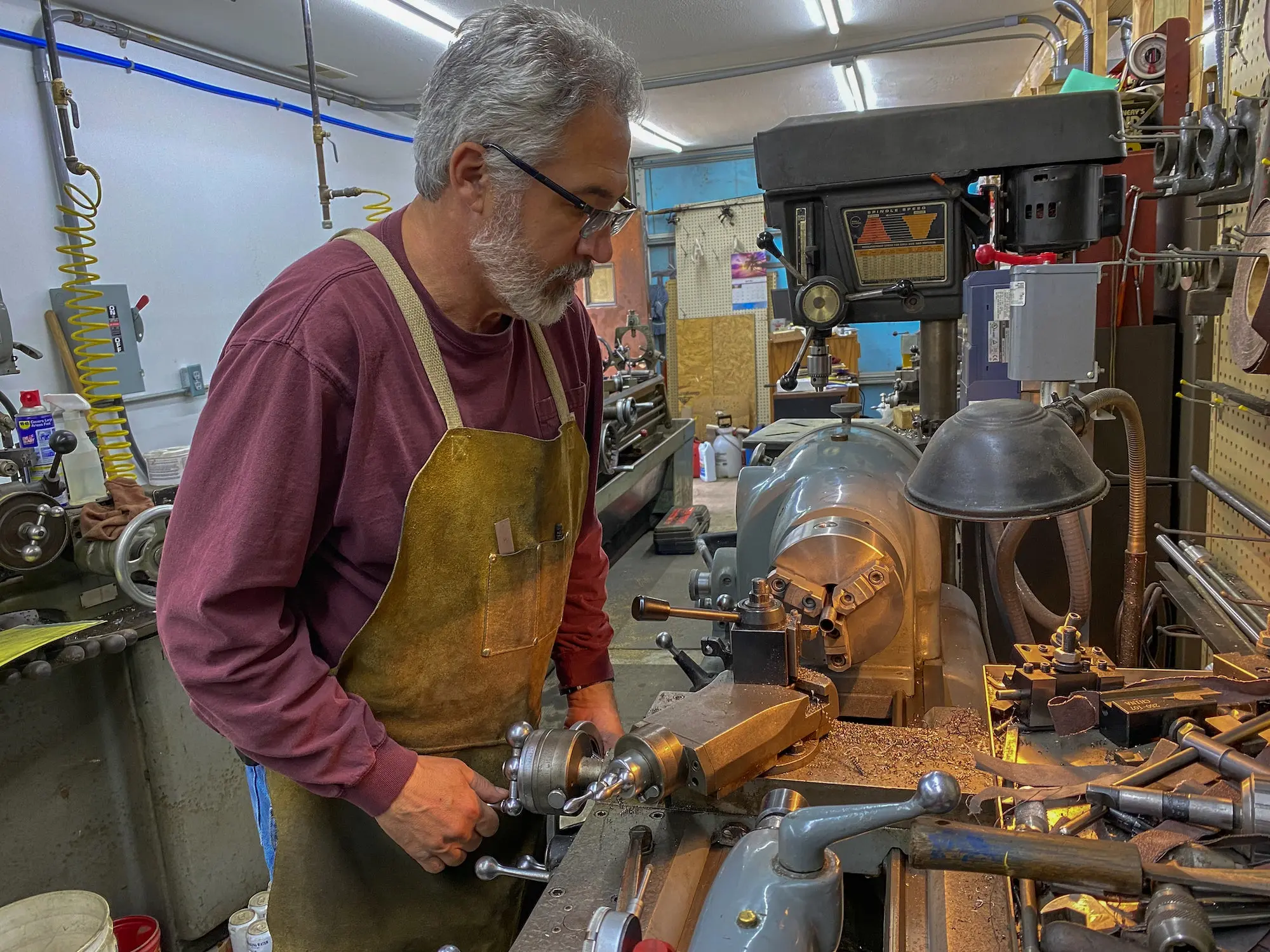 gunsmith working on a rifle.