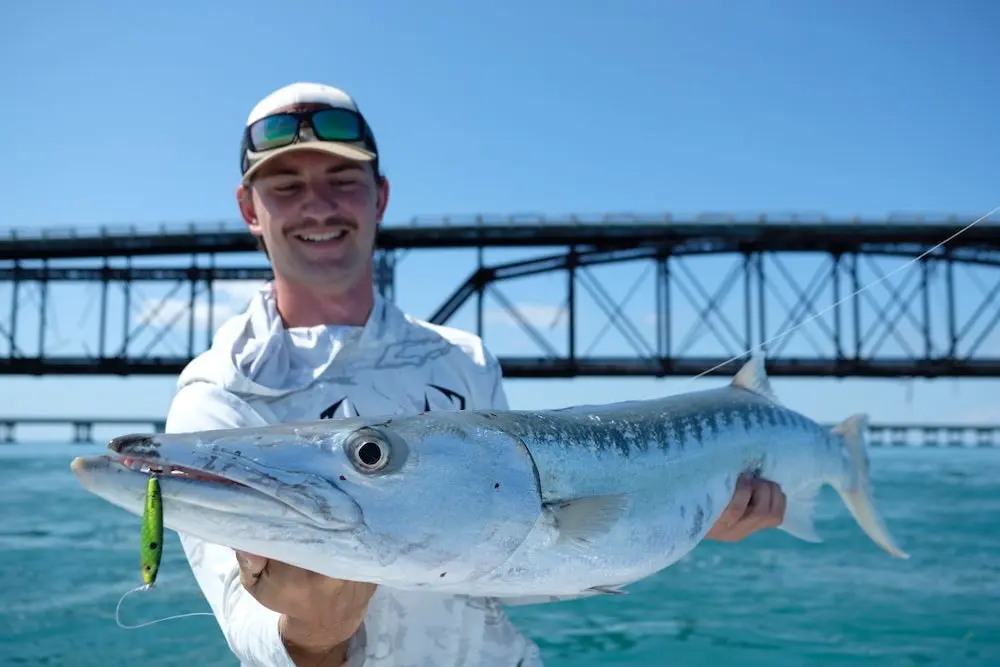 Angler wearing Smith Optics Hookset sunglasses fishing for tarpon