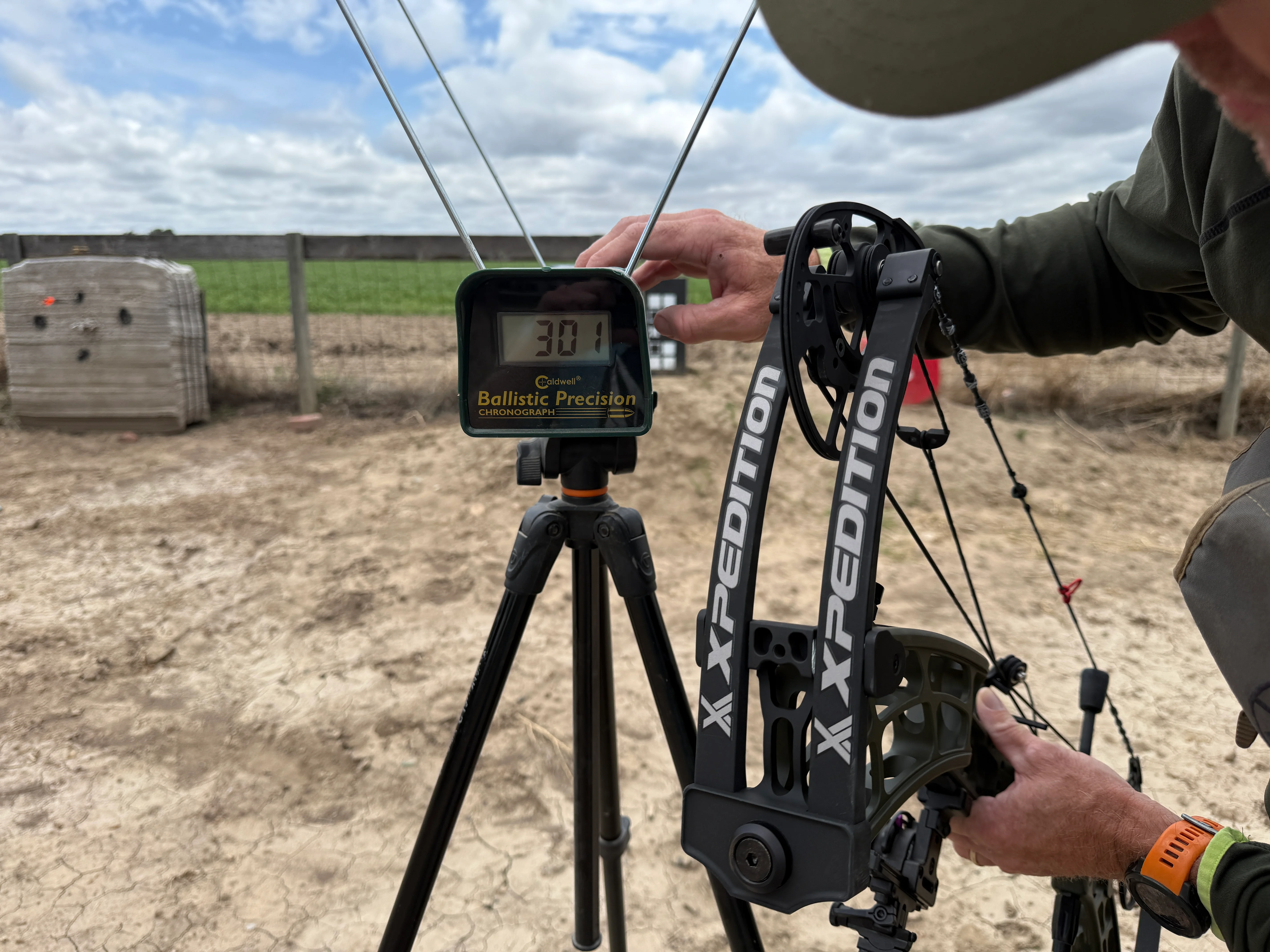 A chronograph showing arrow speed of 301 fps for Xpedition XLite 32 compound bow. 