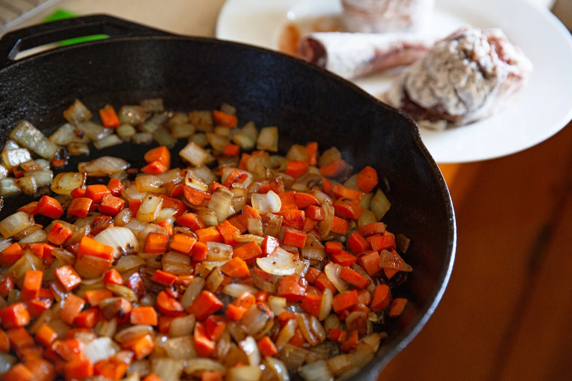 sauted vegetables in a pan.