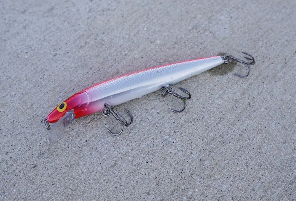 Rapala Husky Jerk Lure sitting on table