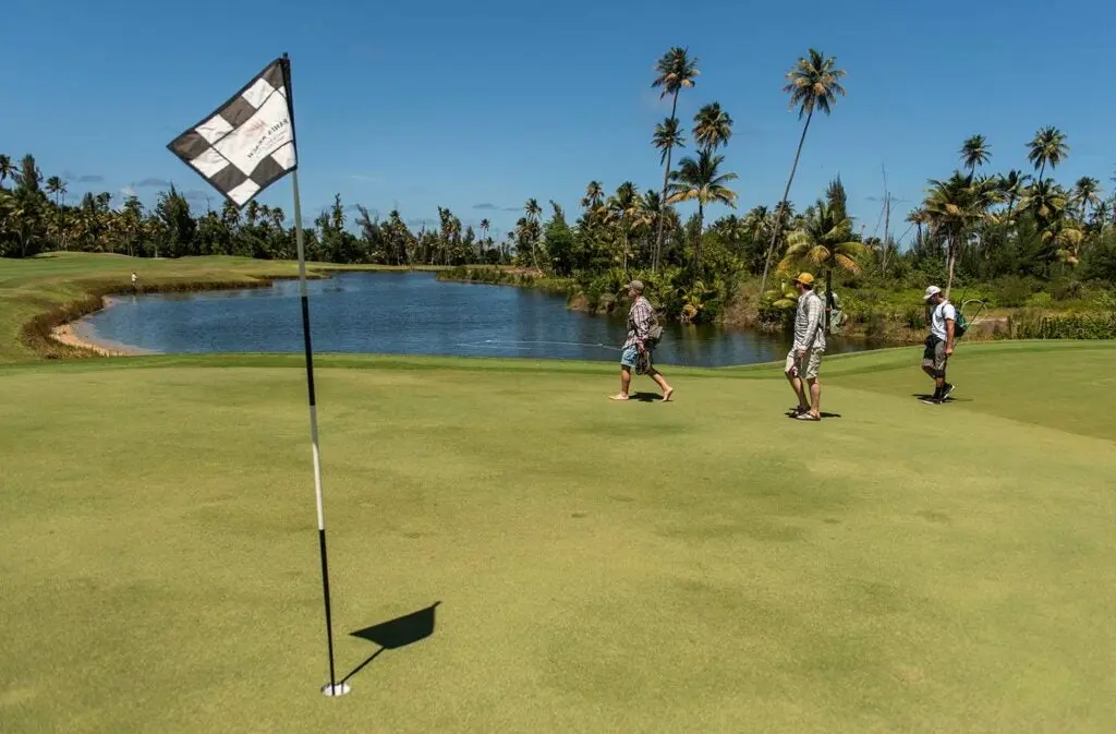 Anglers fishing on a golf course.