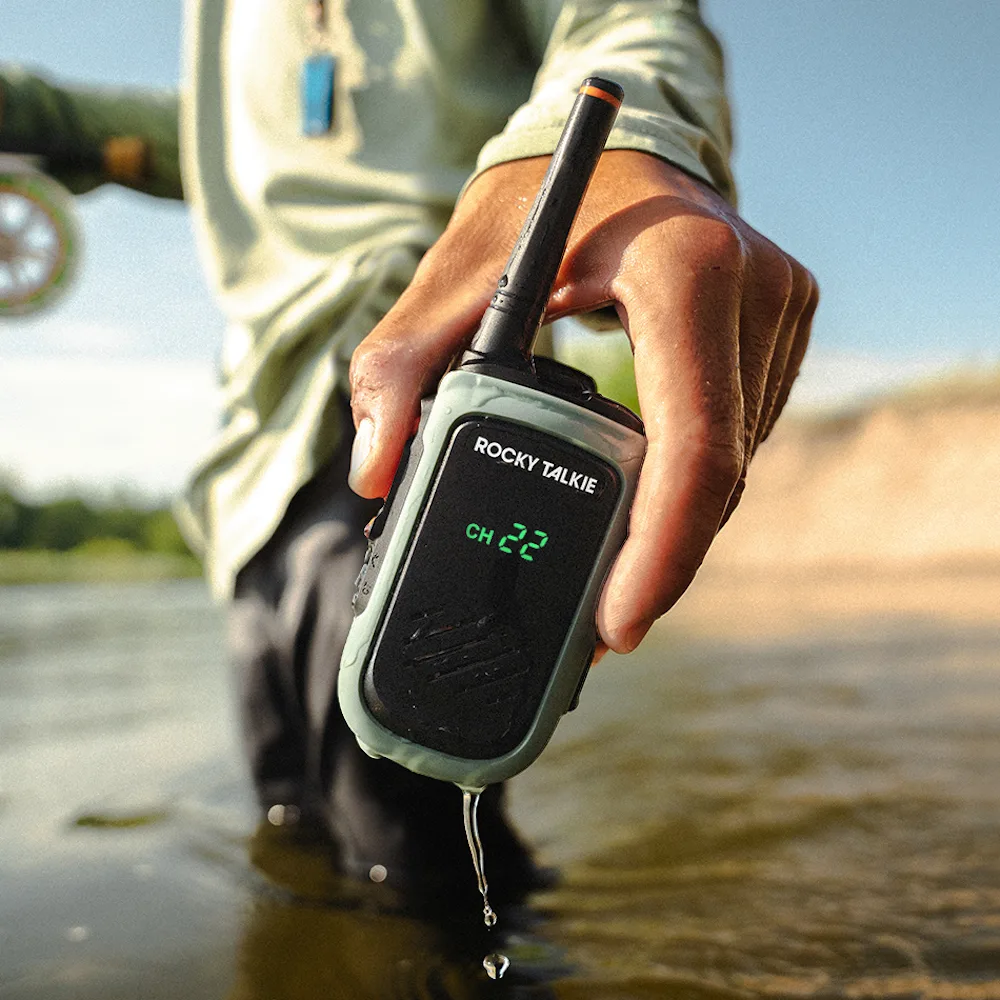 Angler holding waterproof Rocky Talkie 5 Watt Radio