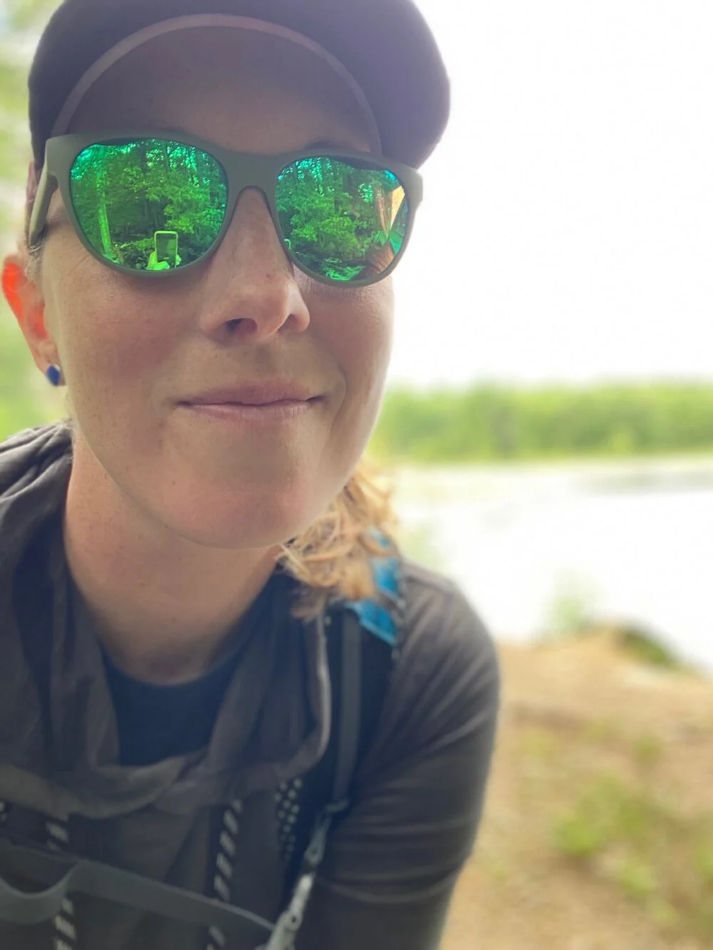 Woman wearing Koo Cosmo sunglasses for hiking