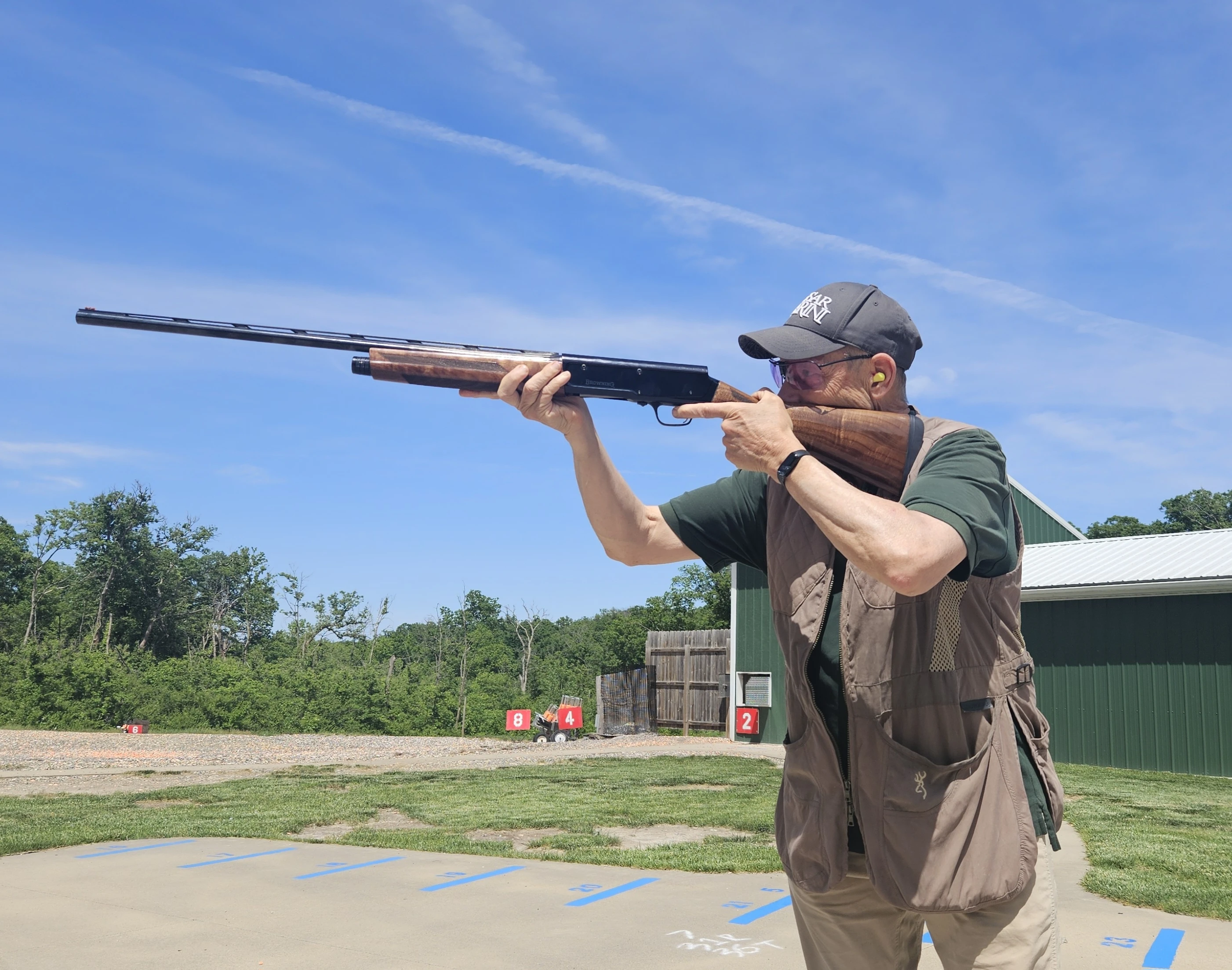 A shooter fires the new Browning A5 Hunter 20-gauge on the skeet range. 