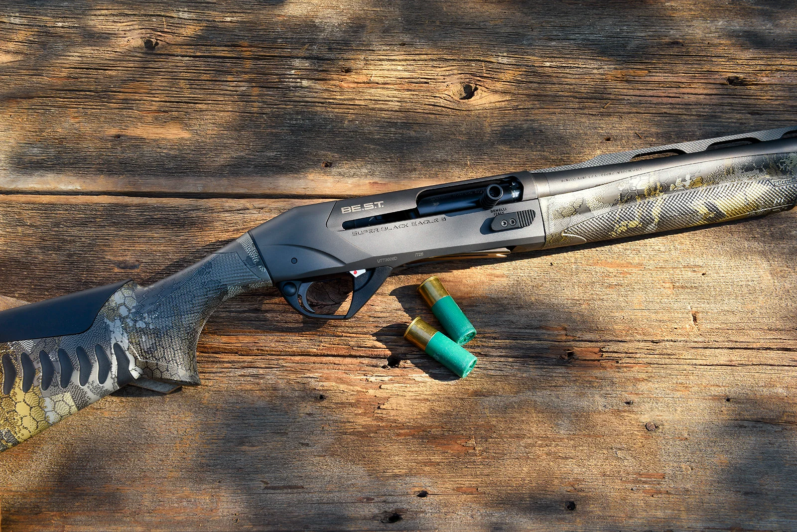 Closeup photo of Benelli SBE 3 A.I. BES.T. shogun on barn boards with shotgun shells.