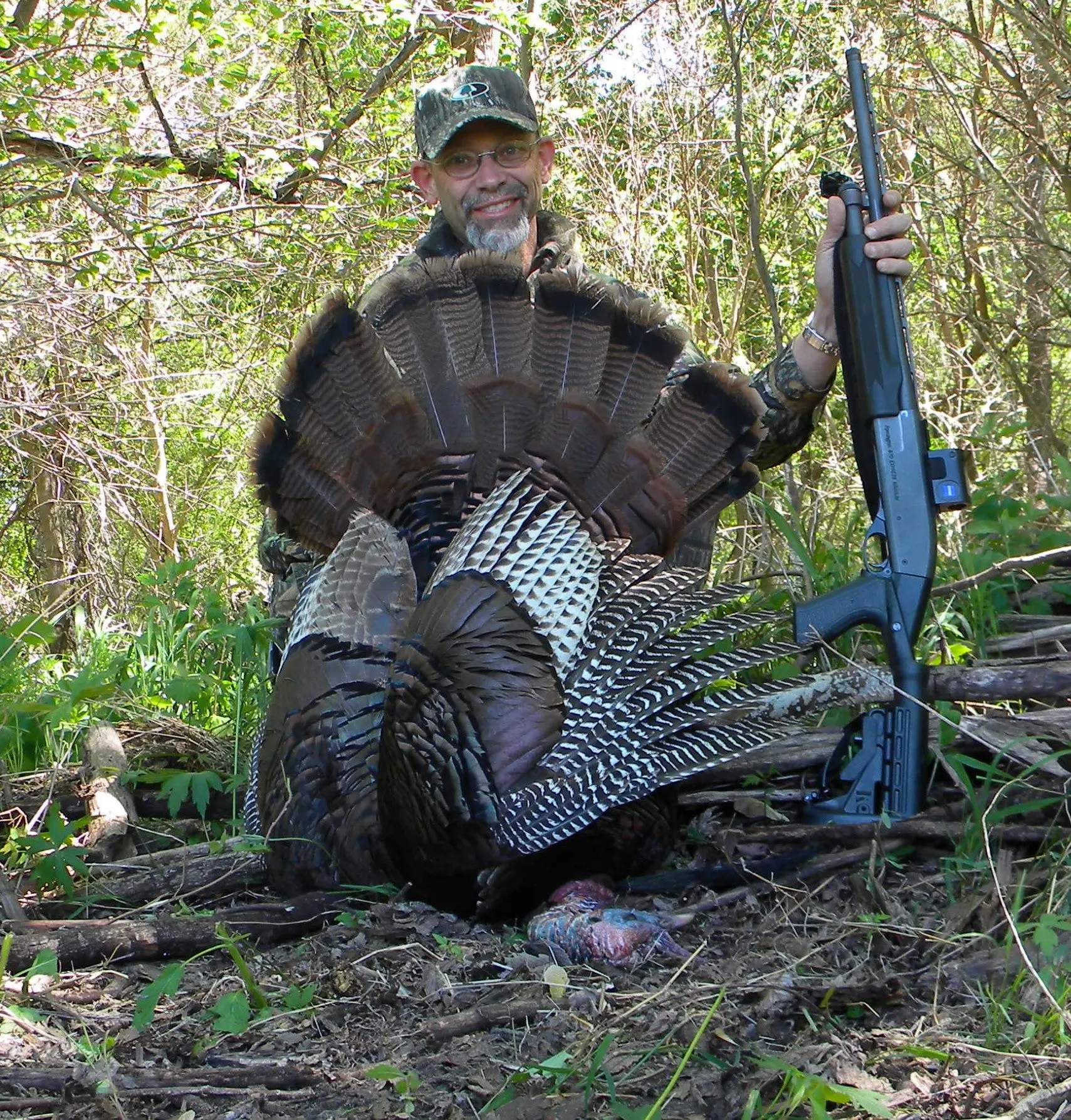 photo of hunter with turkey