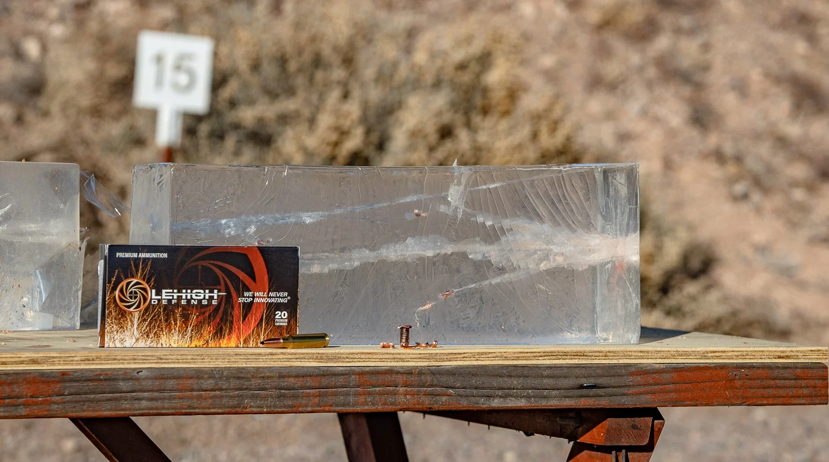 Lehigh Defense Tipped Xtreme Chaos Hunting ammo on a table with ballistics gel in background.