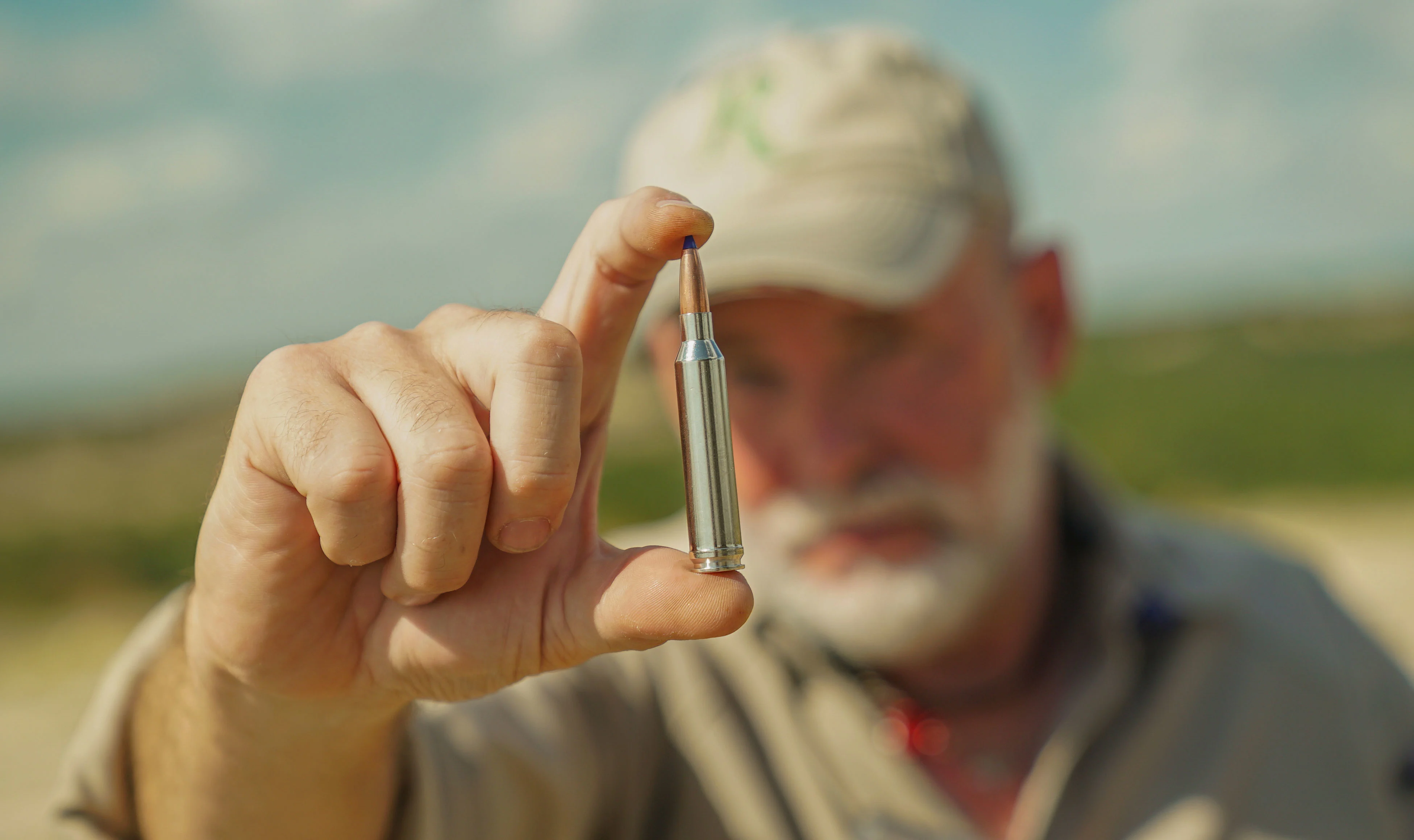 The holds up a 7mm Remington Magnum cartridge. 