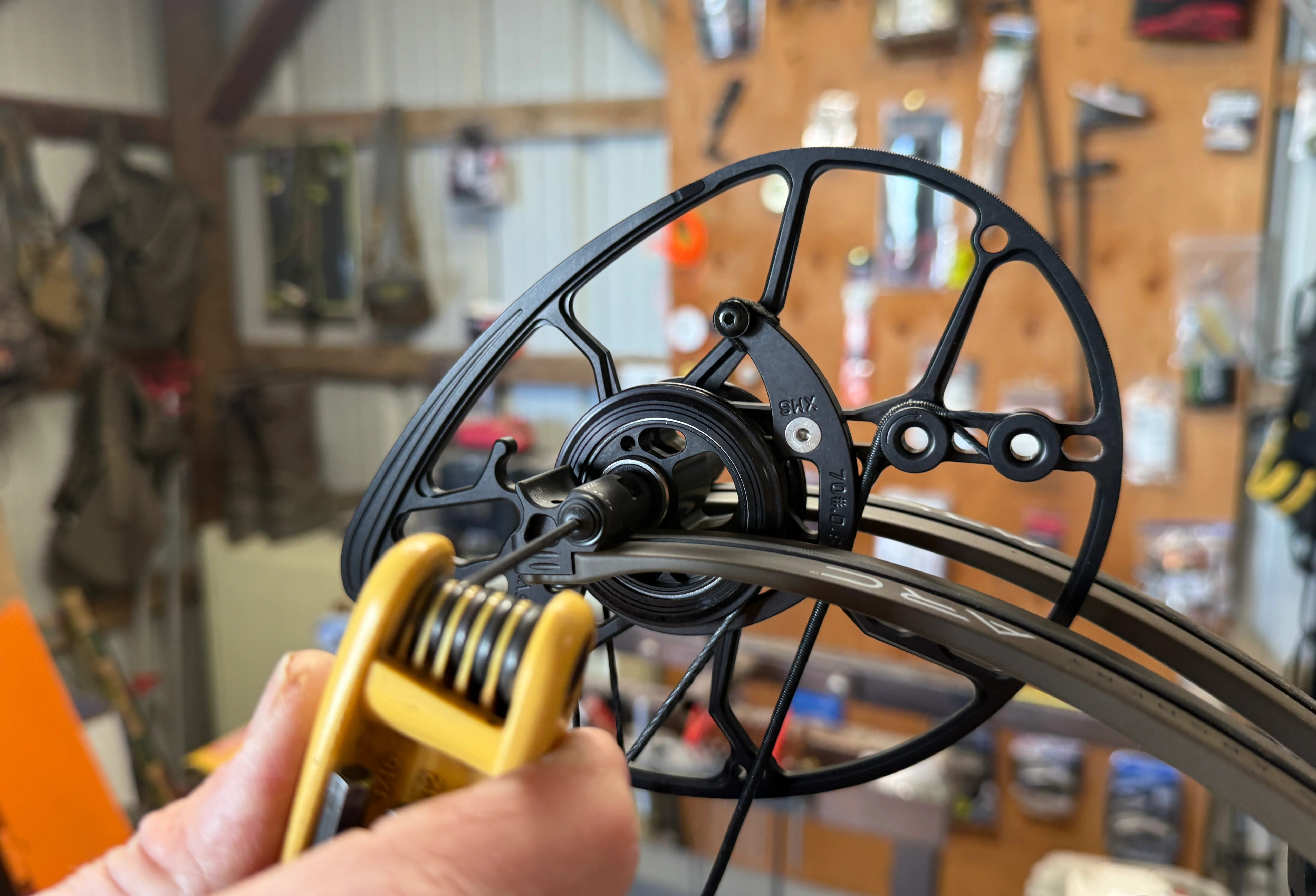 Adjusting Limb-Shift Technology tuning system on the Mathews ARC 30 compound bow. 