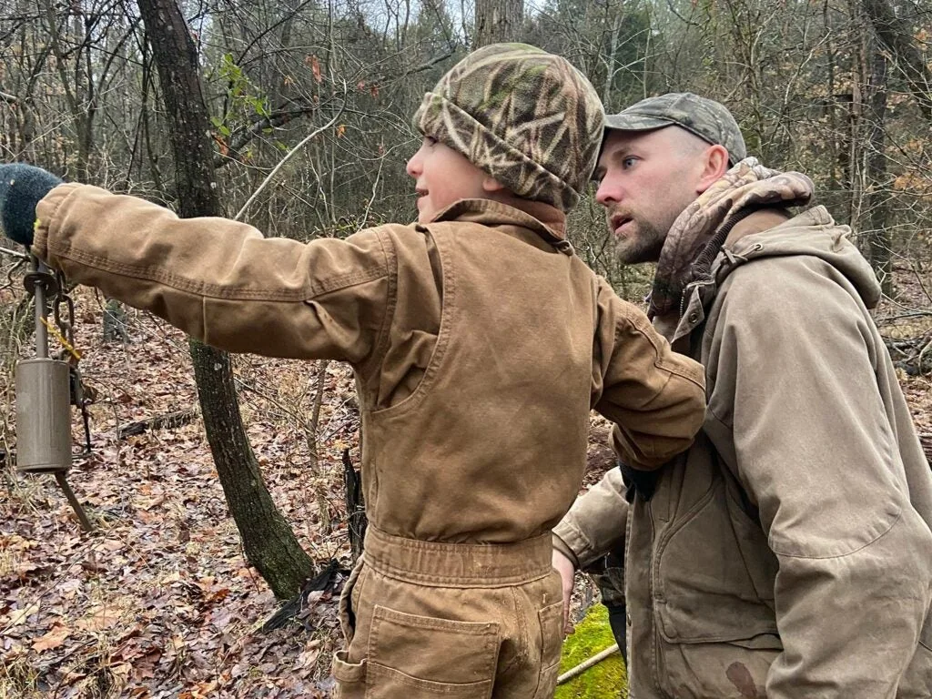 Author and son scouting for raccoons to trap.