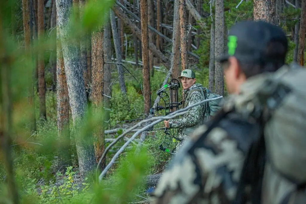 two hunters in the woods