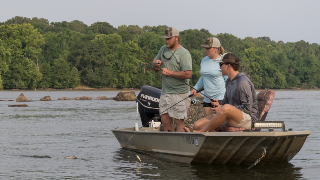 Anglers from Ugly Stik fishing in bass boat