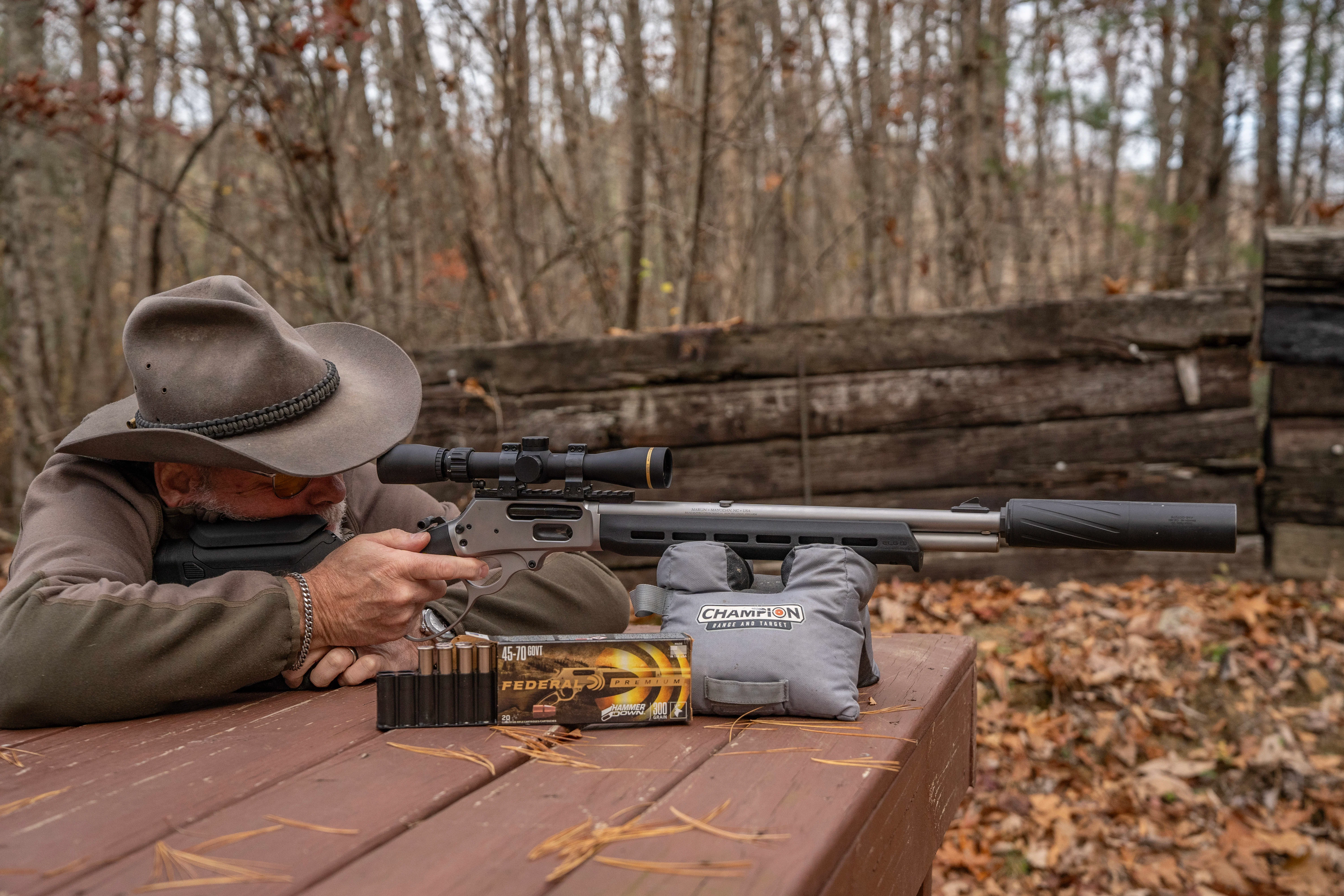 A shooter fires the new Marlin 1895 Trapper Magpul from a bench rest. 