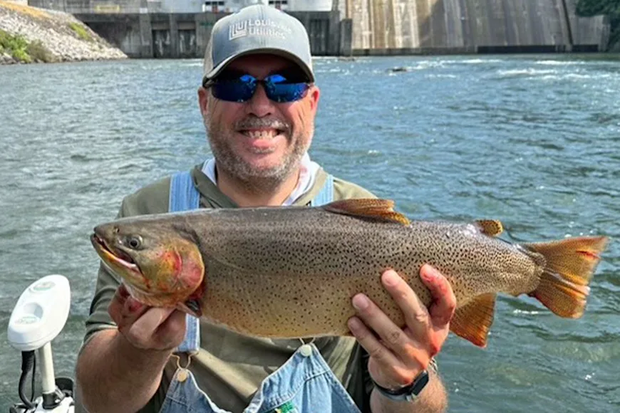 A Tennessee angler poses with the state-record cutthroat trout.