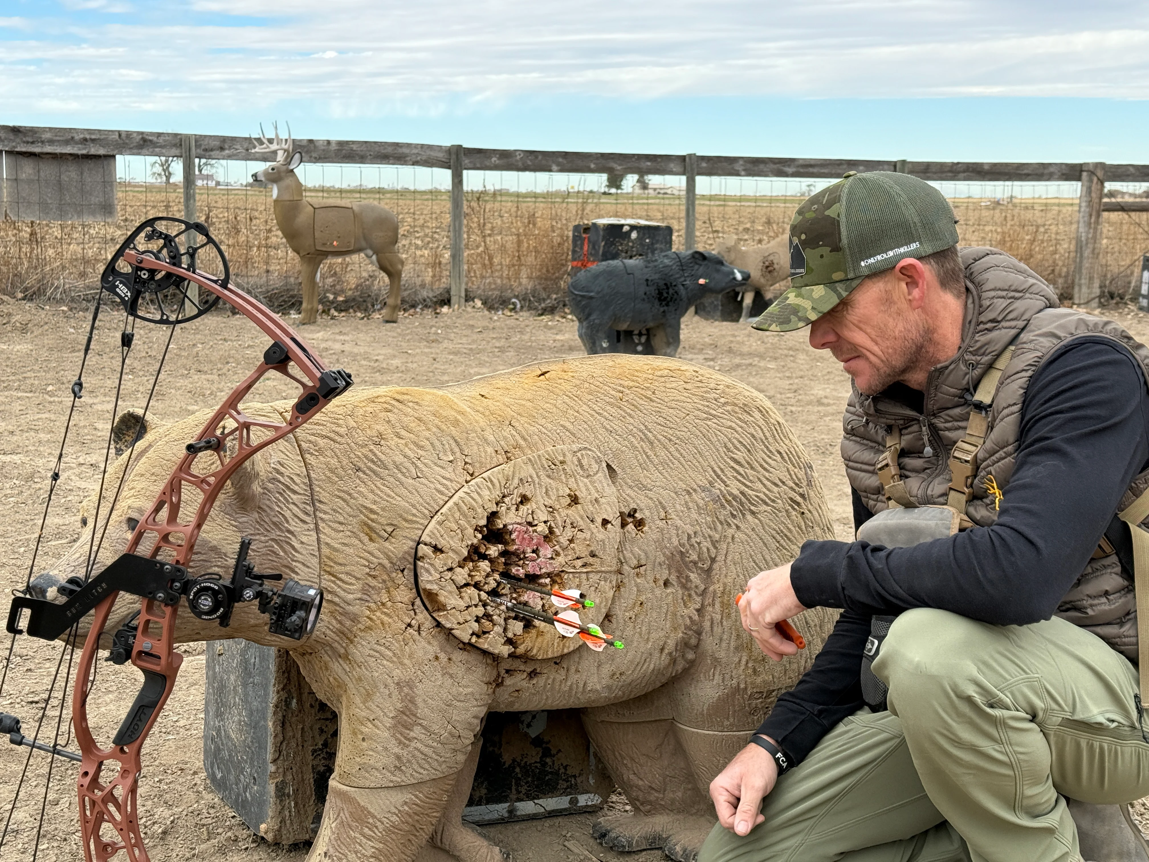 A group of arrows in a 3D bear target shot from the new Hoyt Alpha X-3 compound bow. 