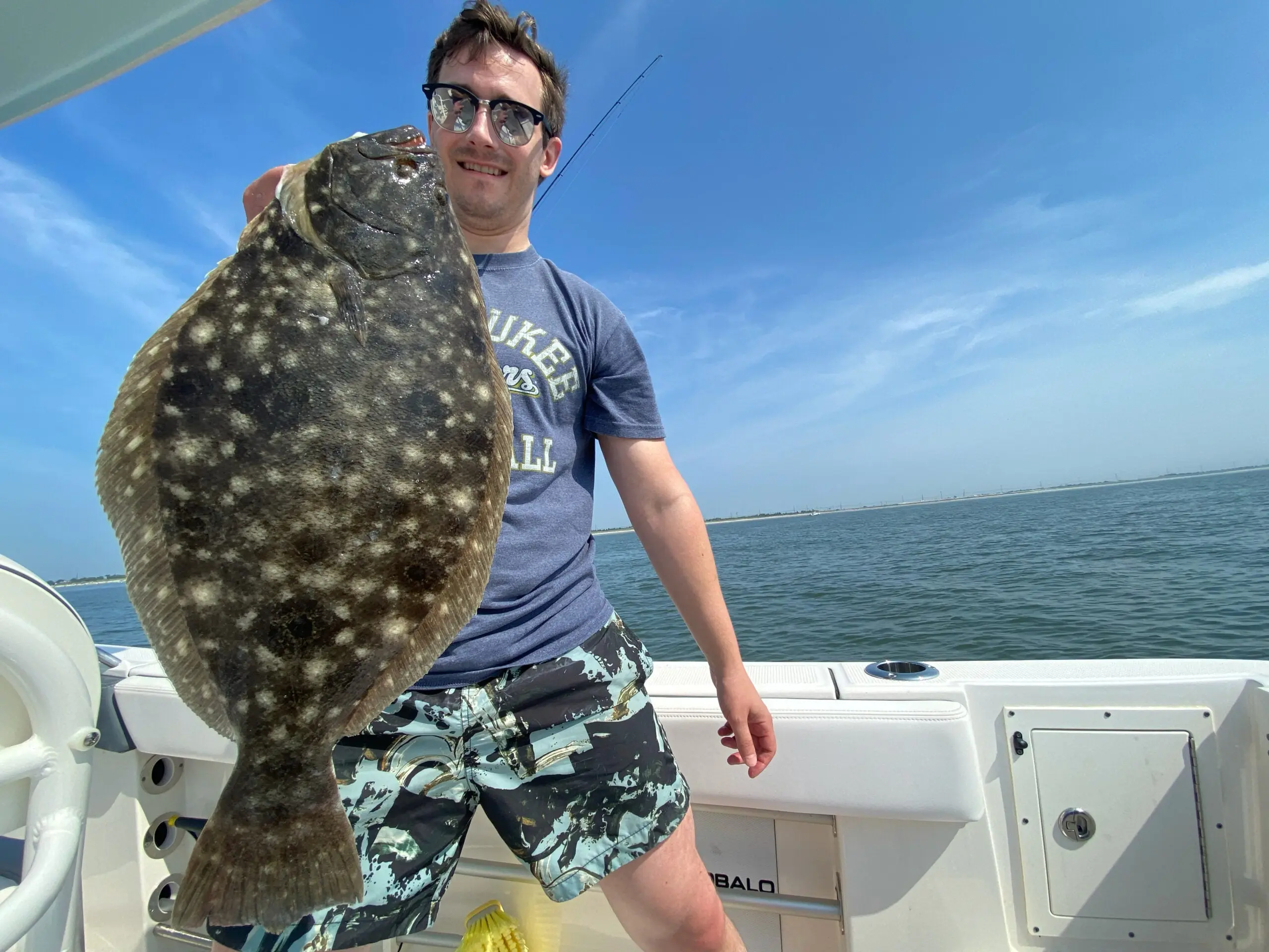 photo of angler fluke fishing