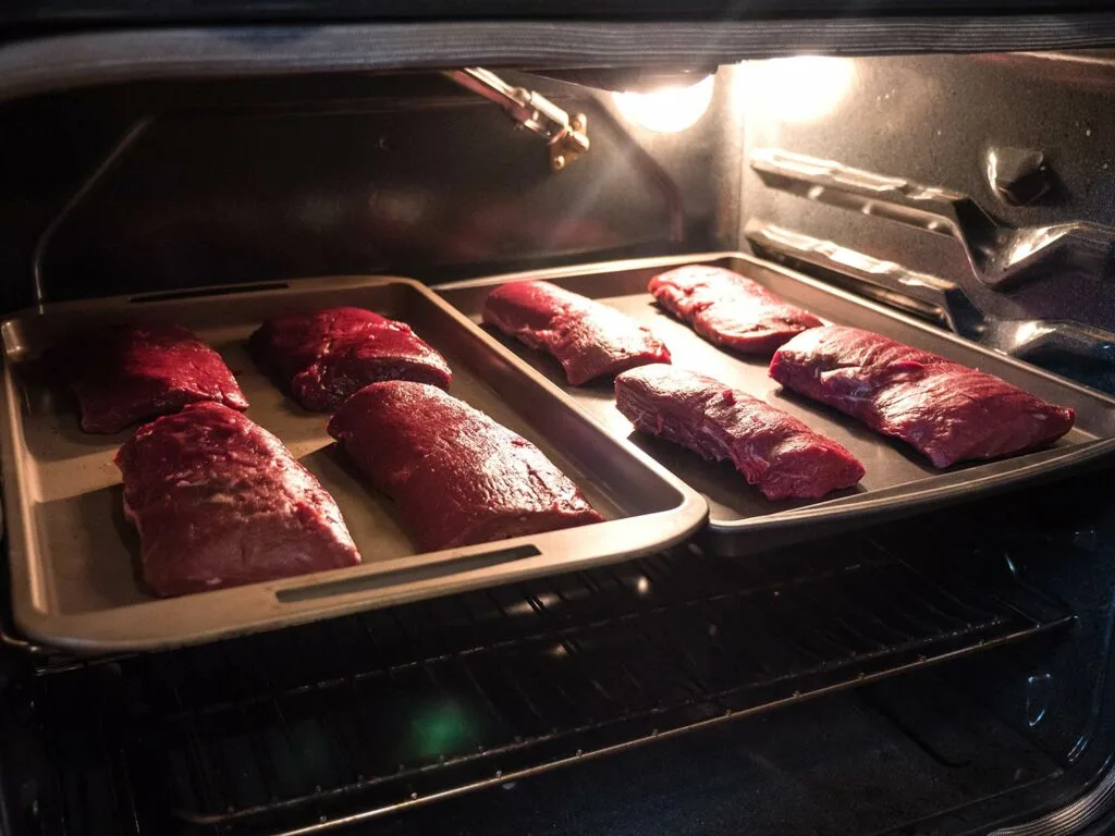 Venison backstraps in the oven.