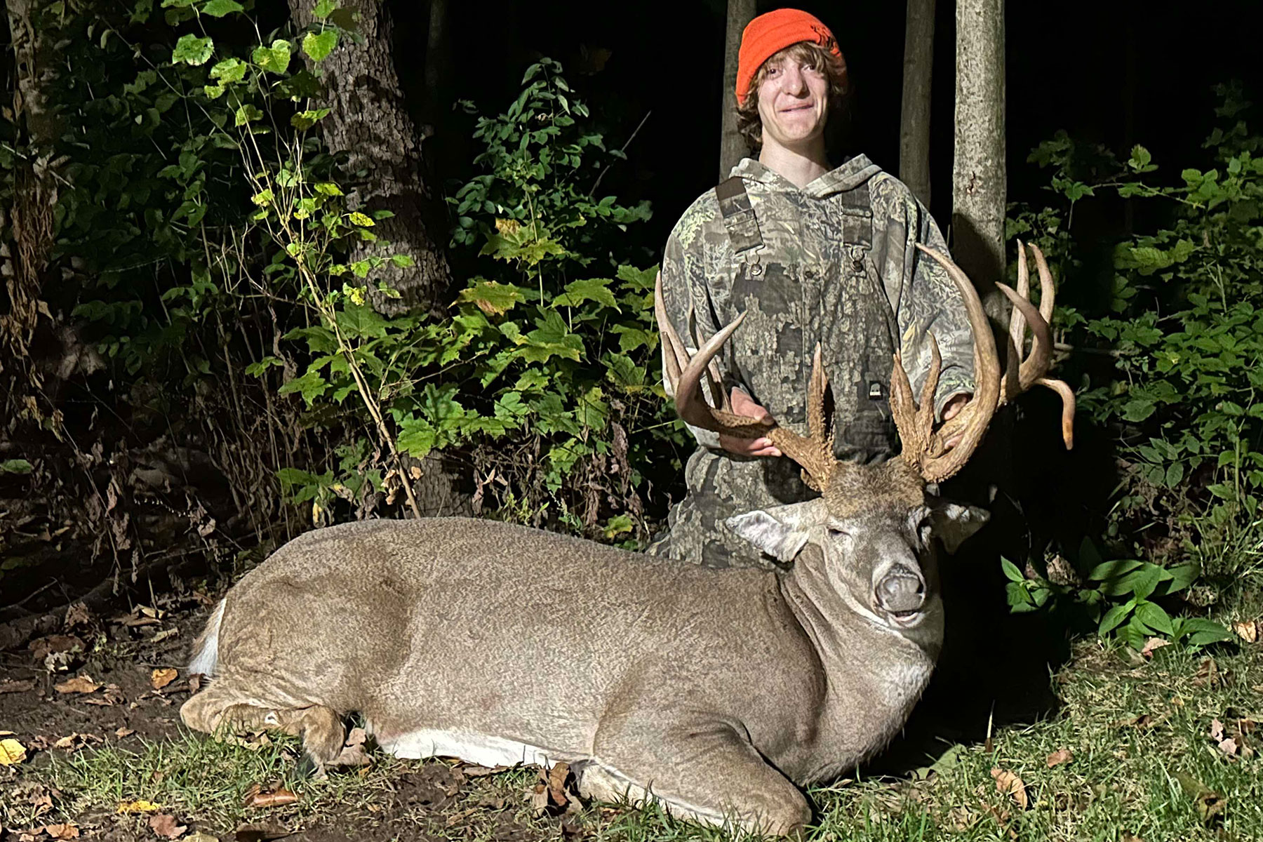 A hunter poses with a 19-point whitetail buck taken in northern Indiana. 