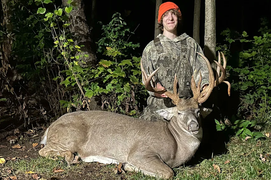 A hunter poses with a 19-point whitetail buck taken in northern Indiana.