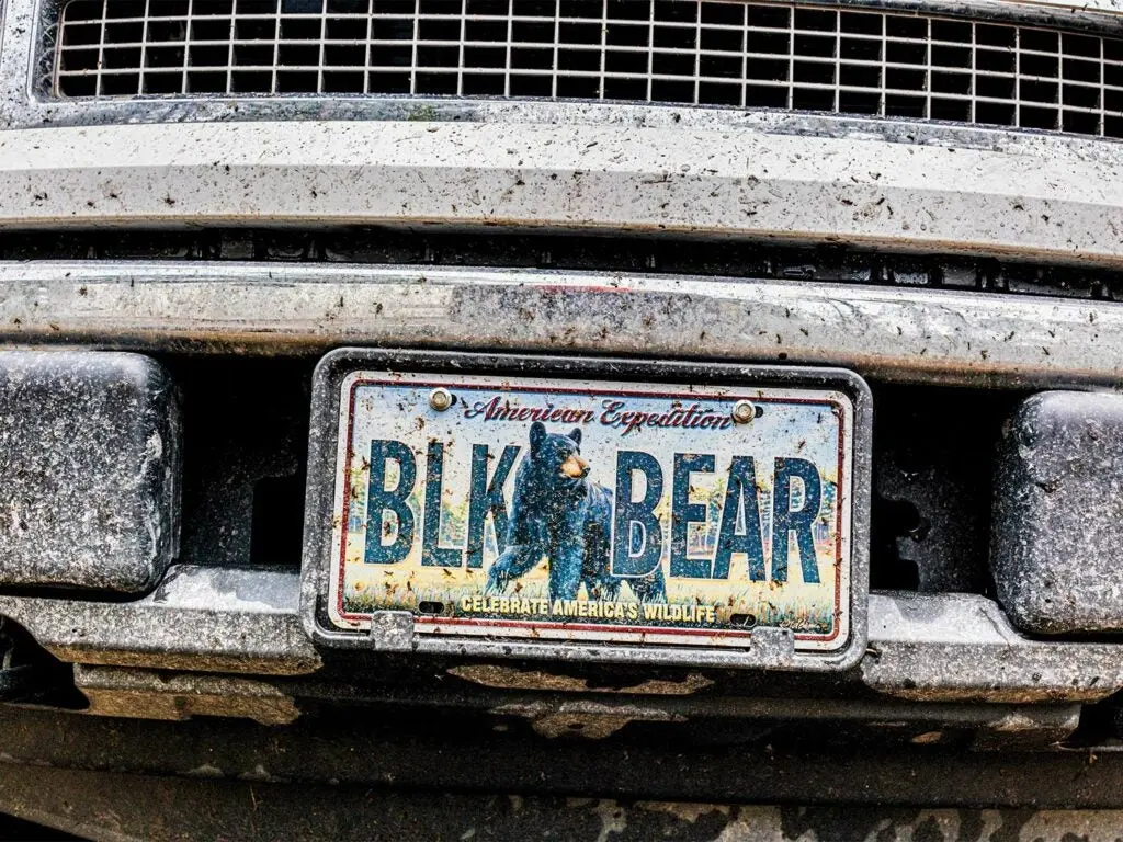 A vanity license plate on a truck that reads 