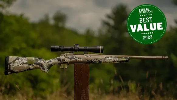 The Browning X-Bolt Speed SPR rifle sits atop a post at the shooting range