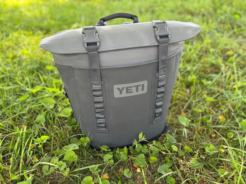 Yeti Hopper M20 backpack cooler sitting on grass