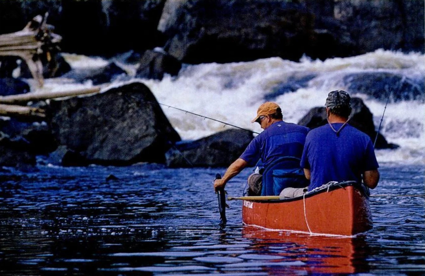 The author grabs a keeper fish for supper.