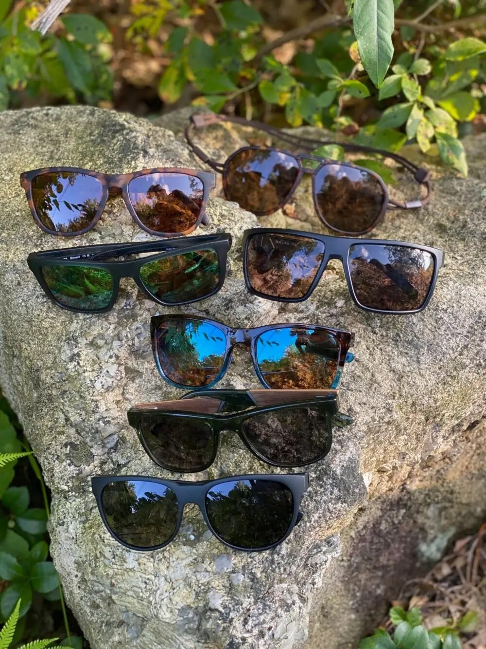 Hiking sunglasses displayed on rock