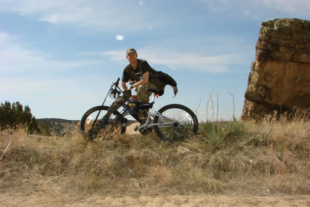 photo of turkey hunter on bike