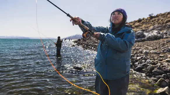 Angler casts fly line with switch rod