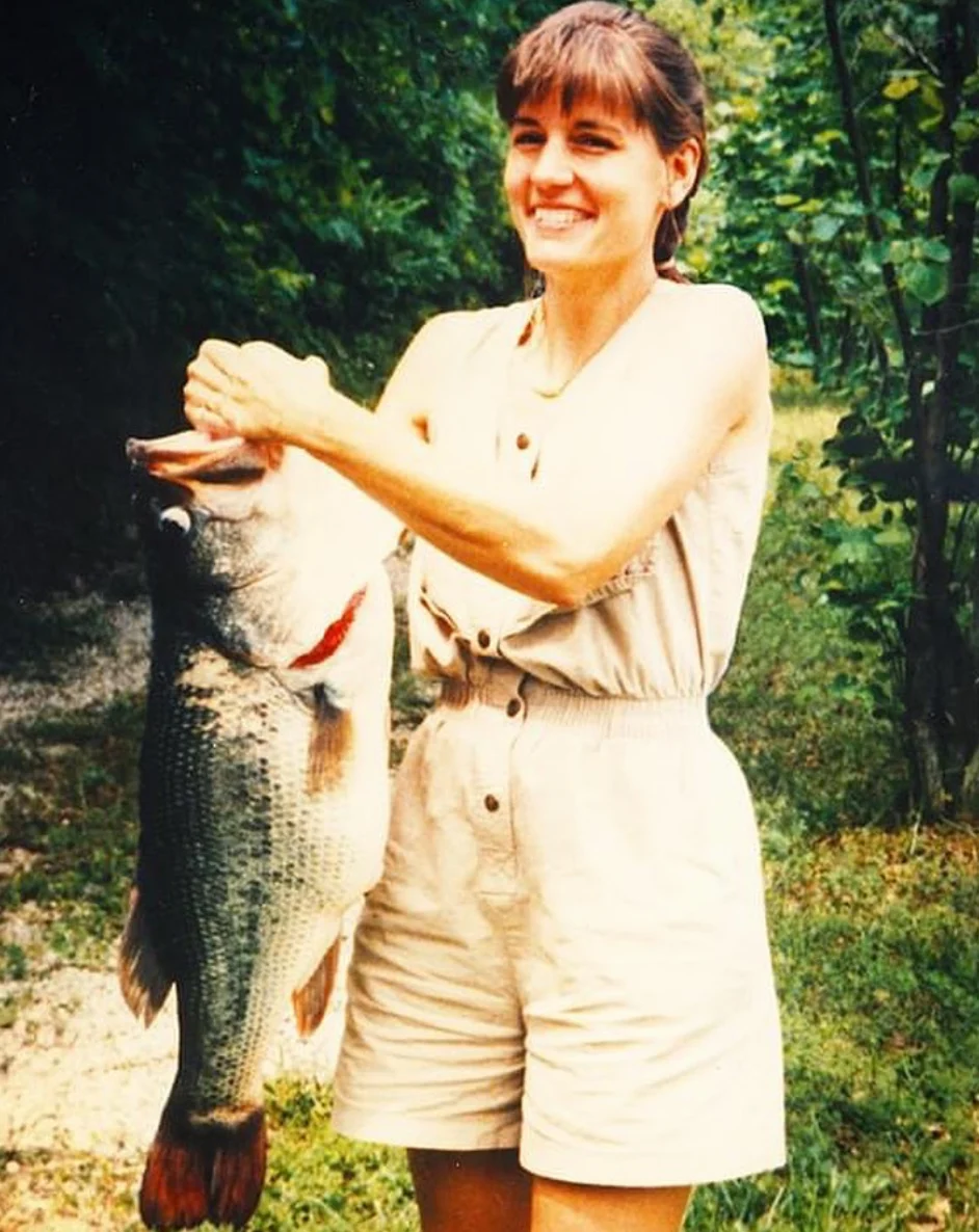 An angler poses with the Indiana record for largemouth bass. 