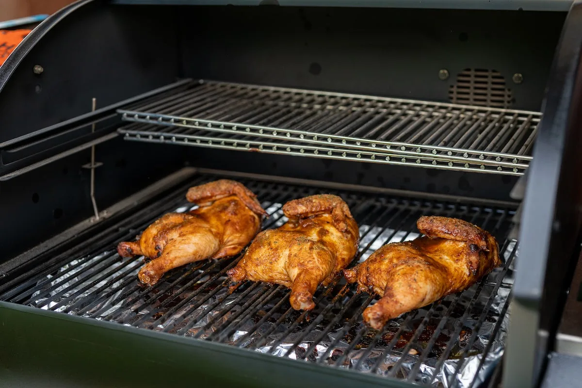 Chicken smoking on Camp Chef Woodwind Pro 24 pellet grill and smoker