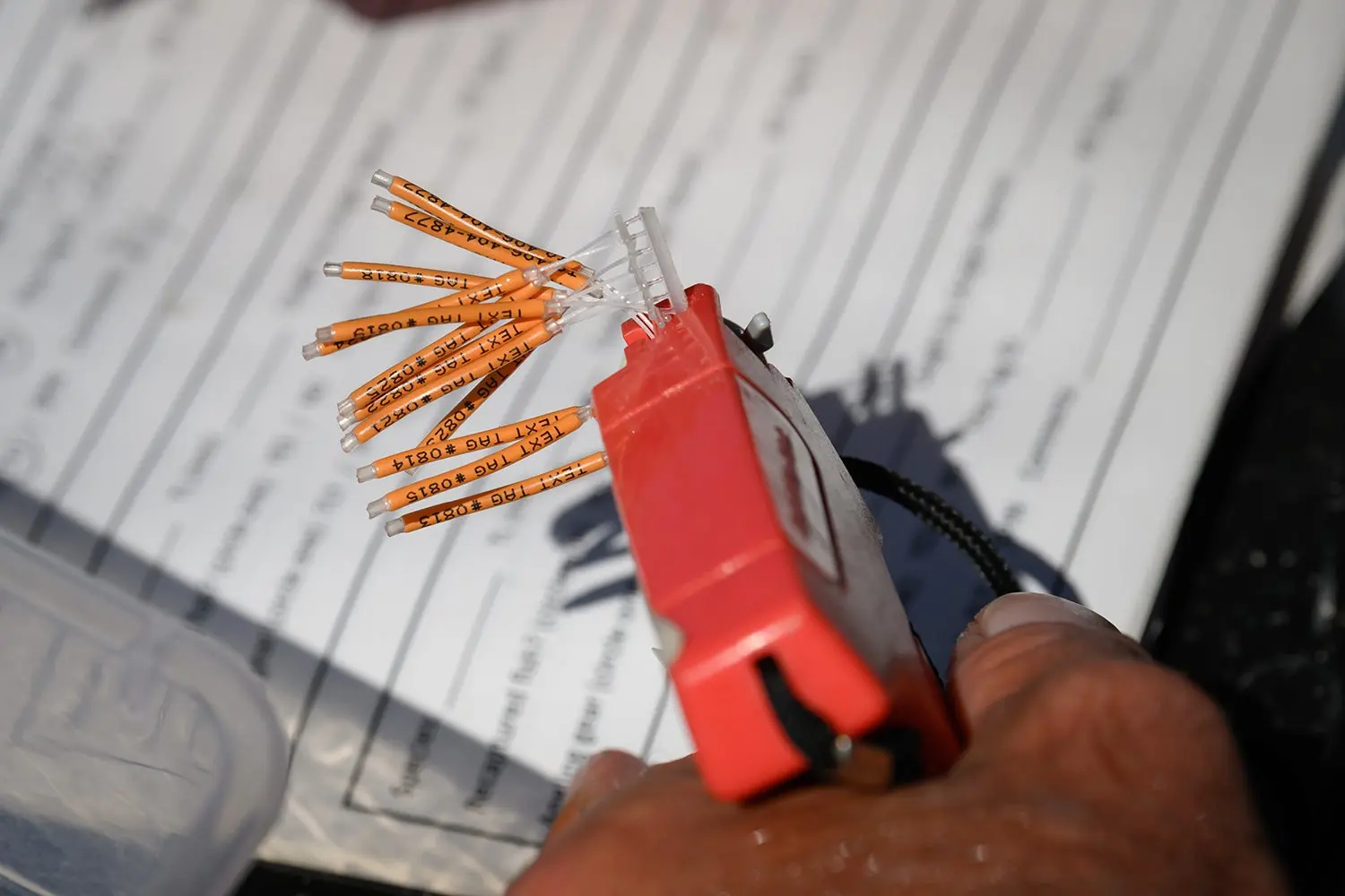 loaded fish-tagging gun close-up