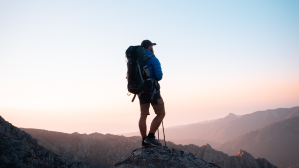 Man hiking at sunset