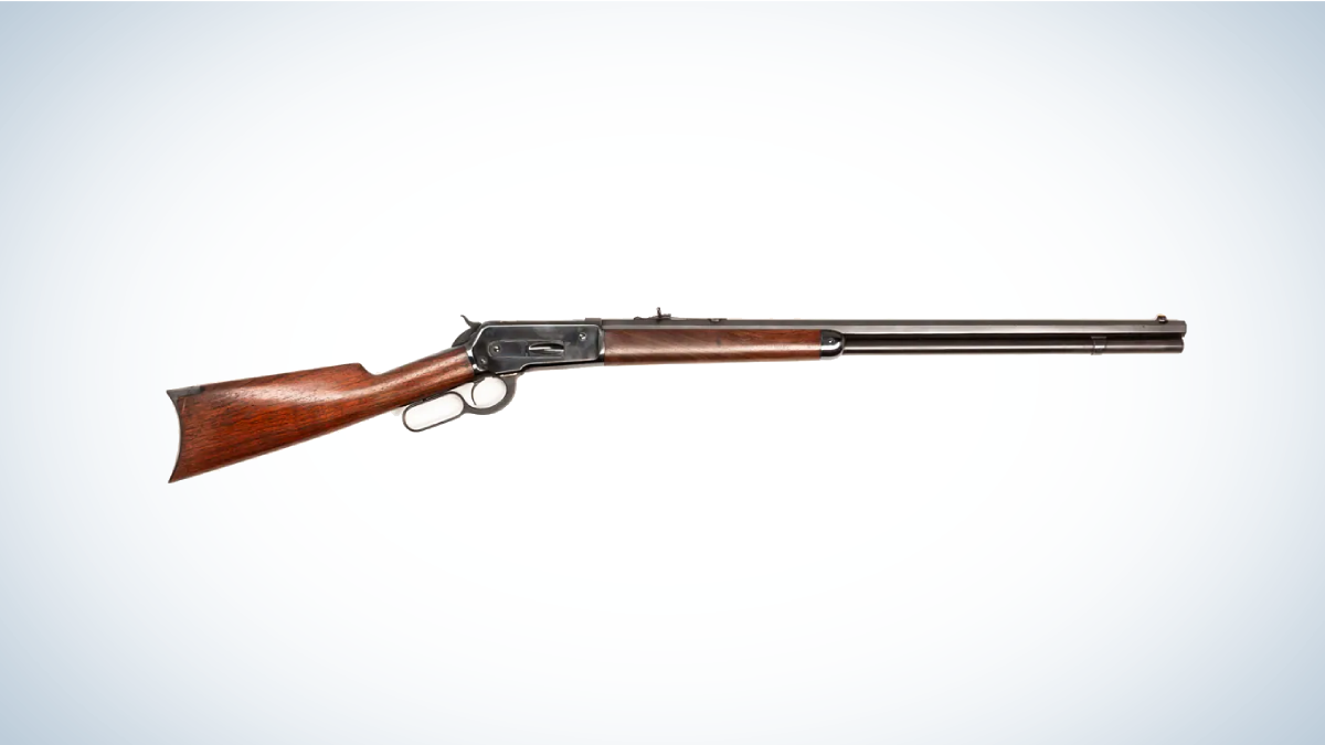 Winchester Model 1886 Lever Action Rifle on gray and white background