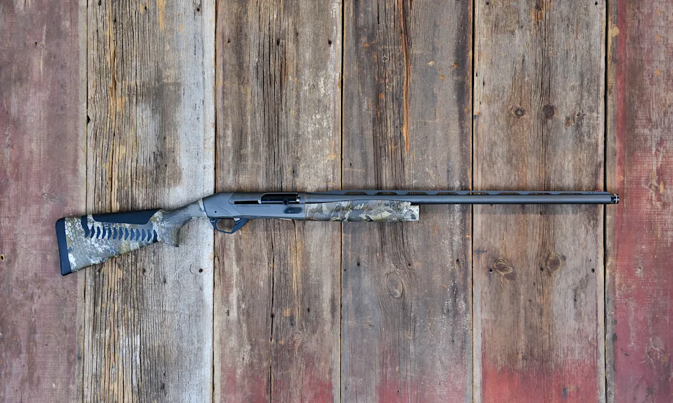 The new Benelli SBE 3 A.I. BES.T. shotgun on barn boards.