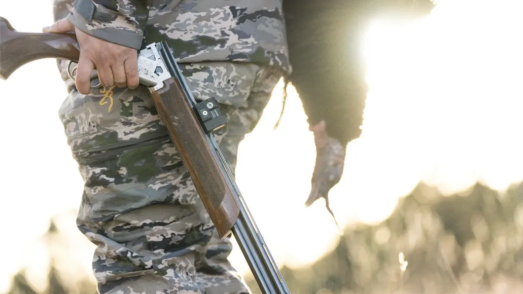 hunter holding browning Citori 725 field .410