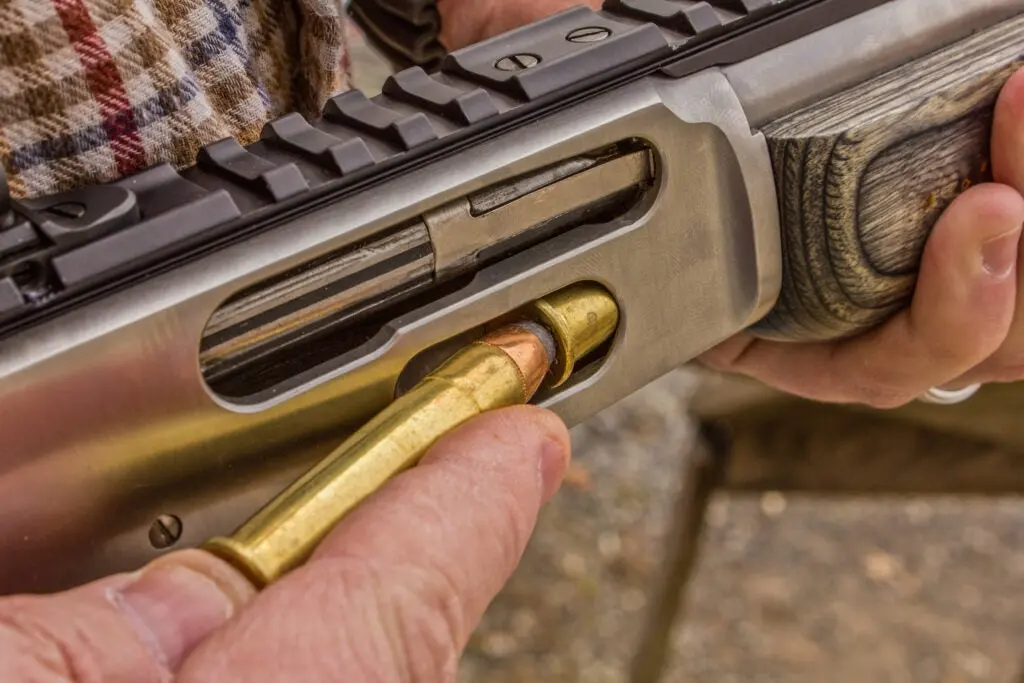 photo of loading a lever-action rifle