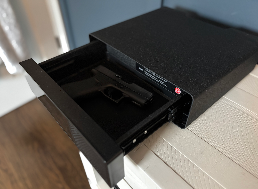 Hornady Rapid Safe Night Guard Handgun Safe open with Glock pistol inside