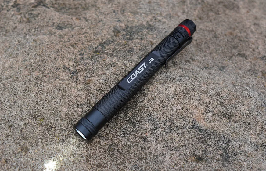 Coast G20 flashlight on ground during testing