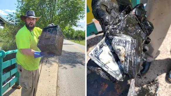 A magnet fisherman shows off a old safe he caught—and the $100 bills inside.