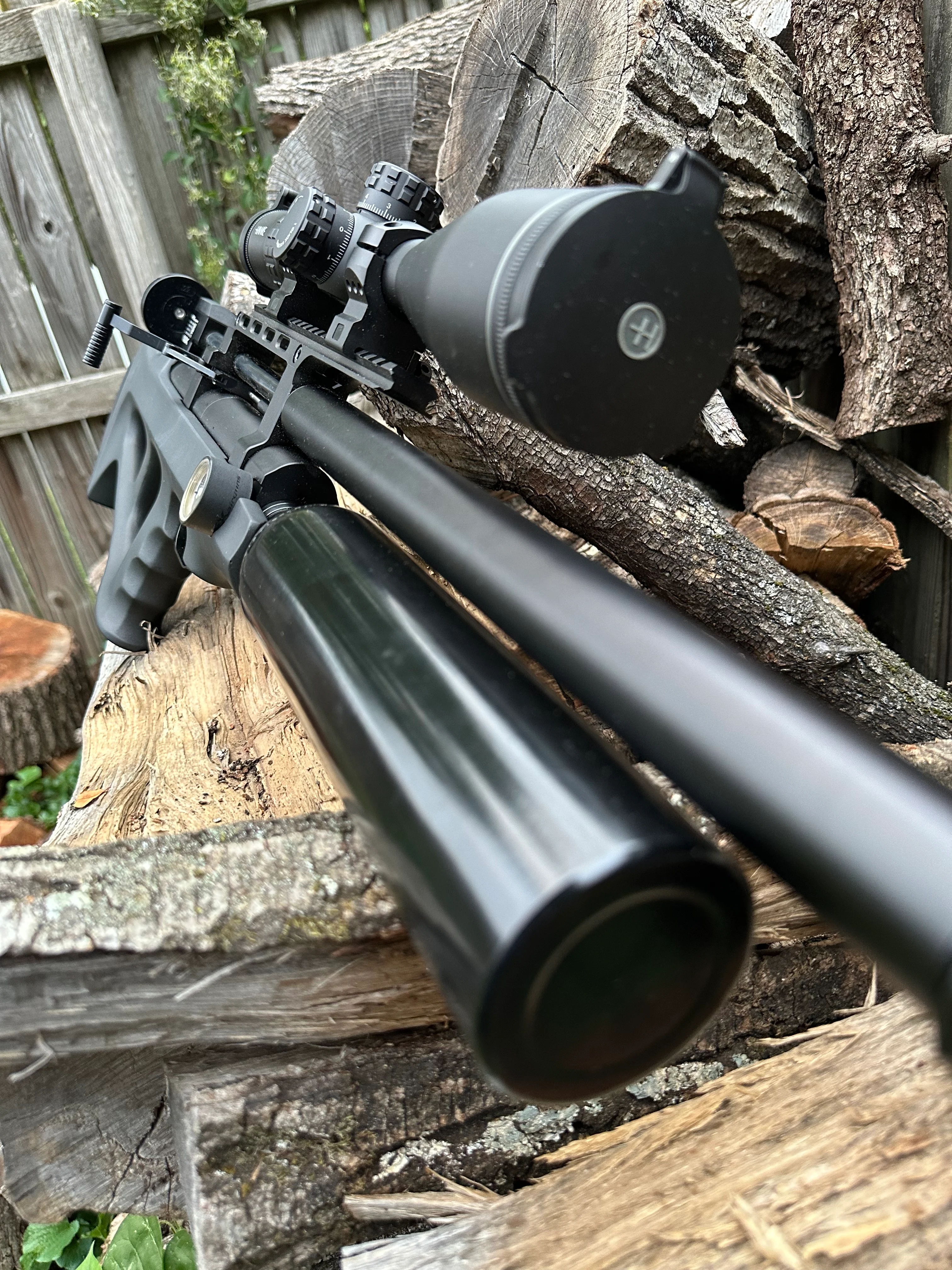 FX Wildcat MKIII air rifle  on a stack of wood