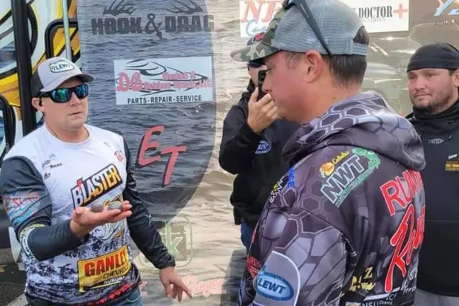 A tournament director confronts a man caught cheating during a walleye tournament in Ohio. 