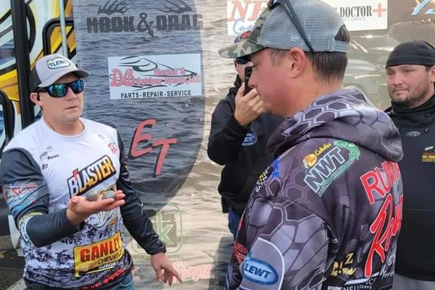 A tournament director confronts a man caught cheating during a walleye tournament in Ohio.